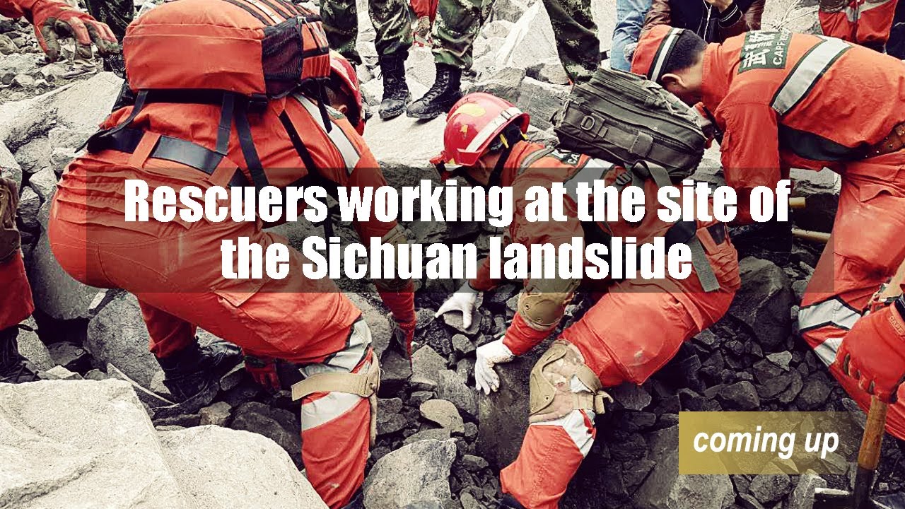 Rescuers working at the site of the Sichuan landslide