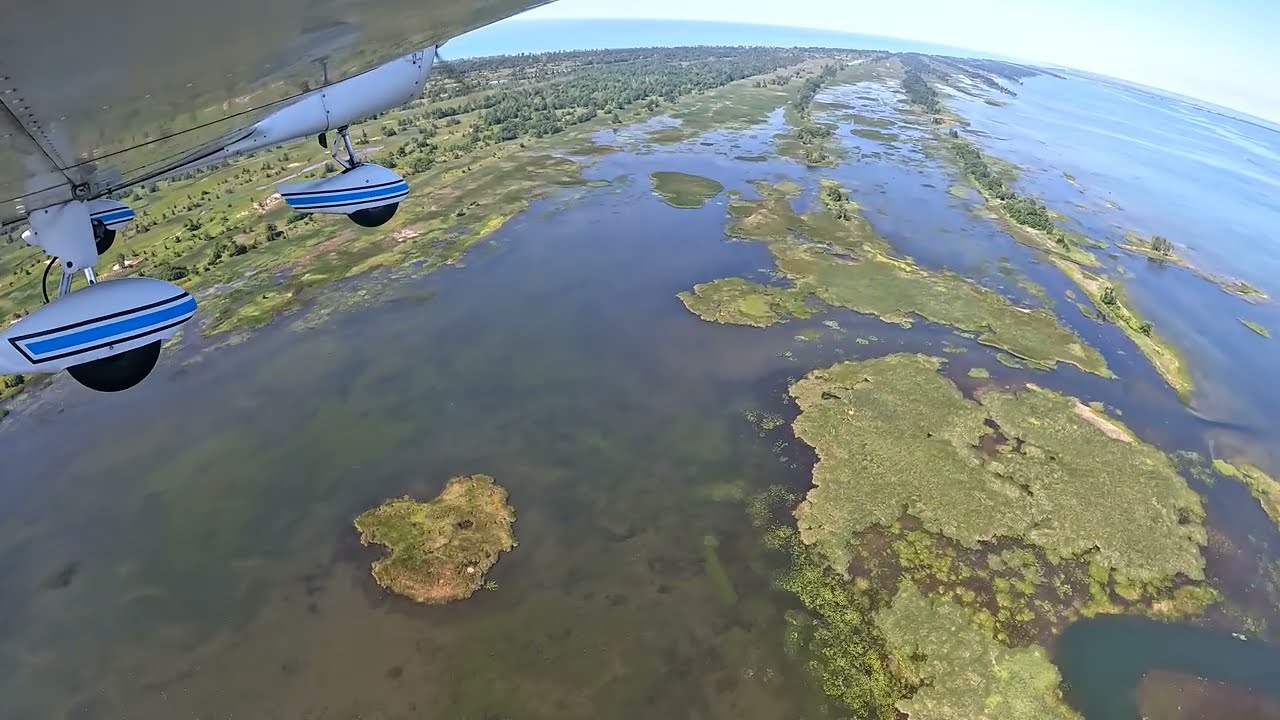 Long Point North Shore Flight From The Tip Lighthouse To The Town Of Long Point, Ontario, Canada 4K