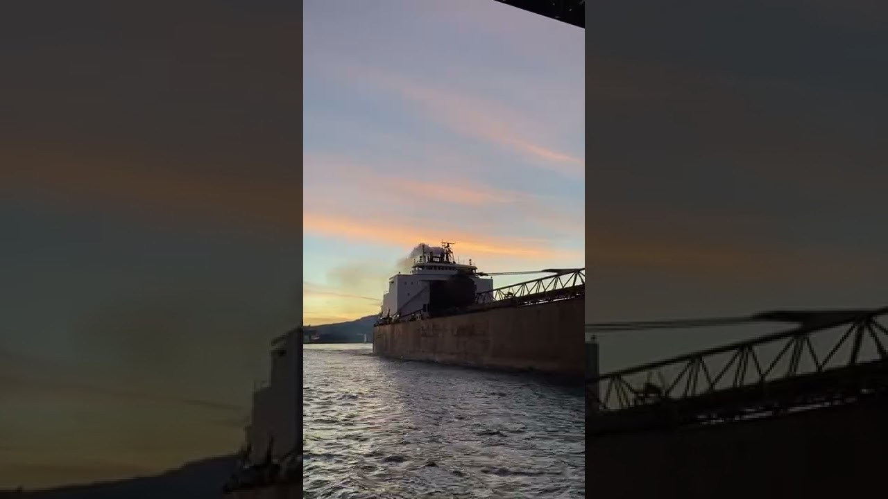 WOW!!! Master Salute between the James A. Baker and the Duluth Lift Bridge.