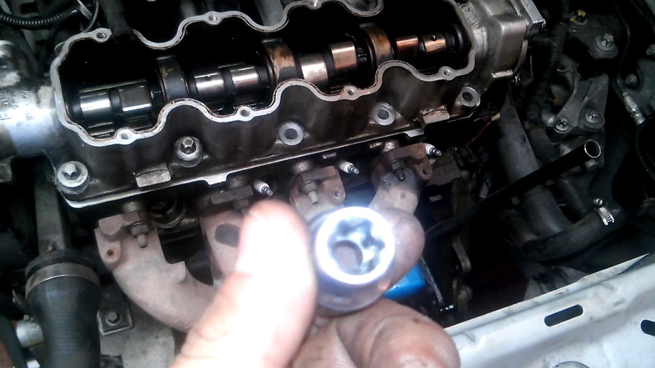 Como colocar desmontar arbol de levas chevy corsa chevrolet fascilmente  parte 1