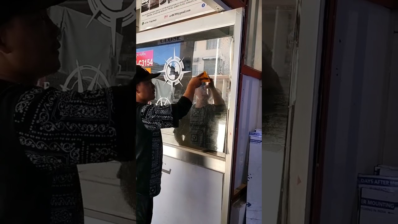 Transparent Glass to a Reflective mirror @ one way vision sticker pasting...