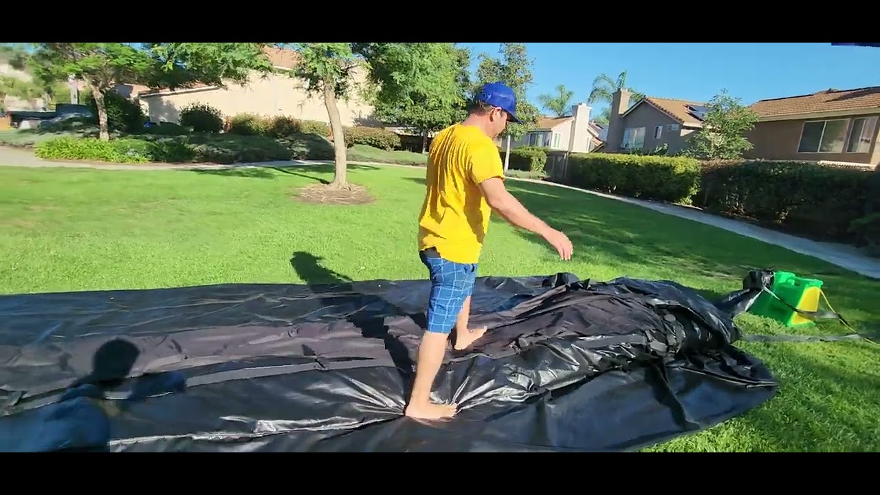 How to roll up an INTIMATE XL series 30ft inflatable movie screen by Superior Inflatables