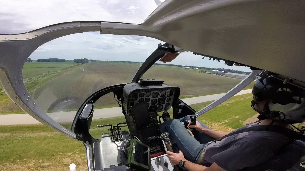 Crop dusting in a helicopter