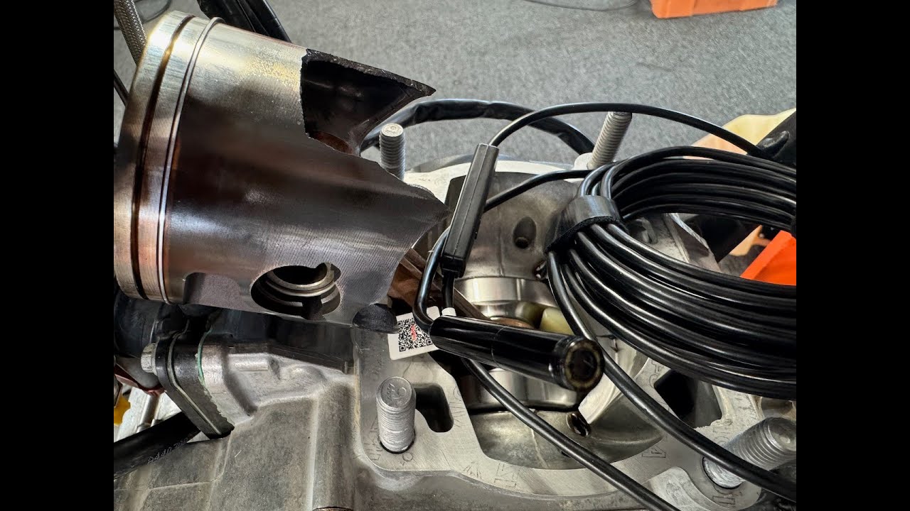 Why did my KTM 300 piston just explode.  Using a $15 phone boroscope to look for the parts.