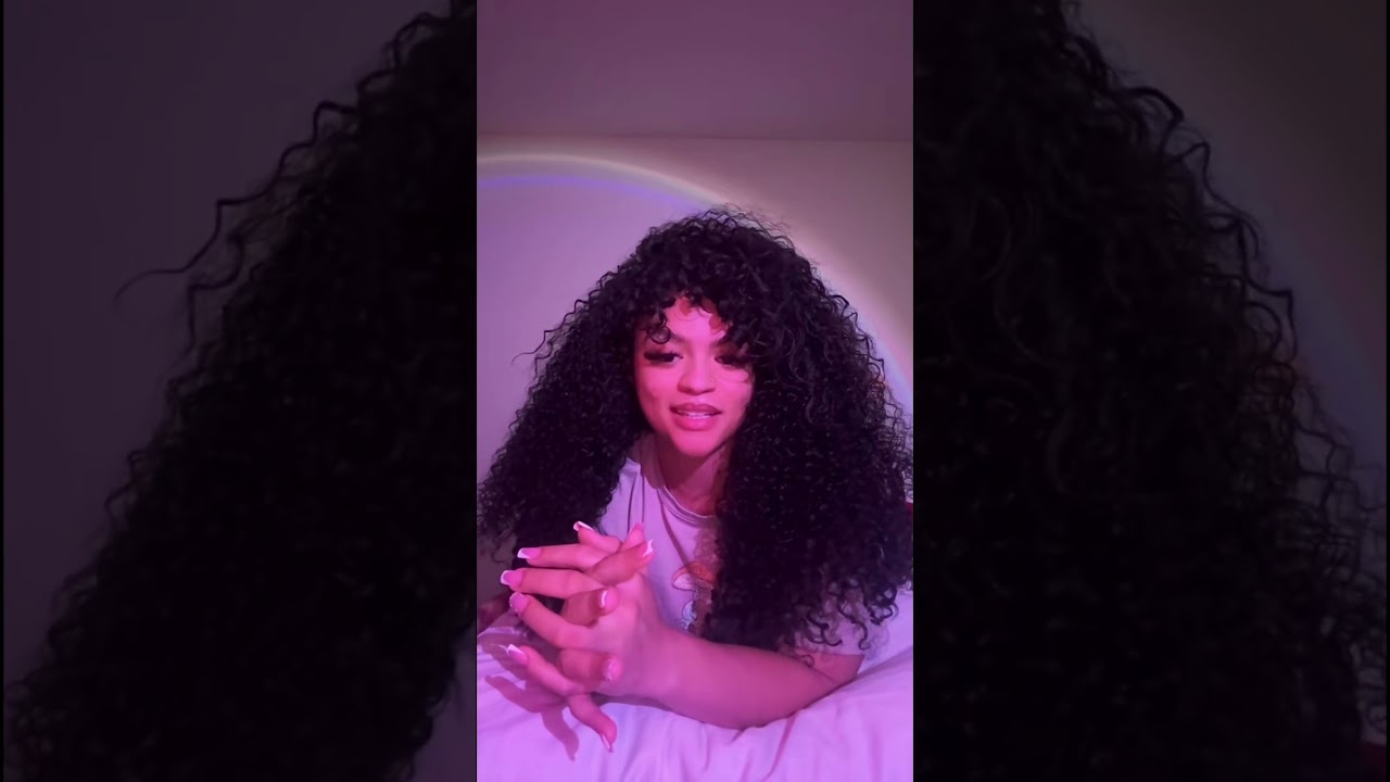 Curly-haired angel gives advice on pumice stones 