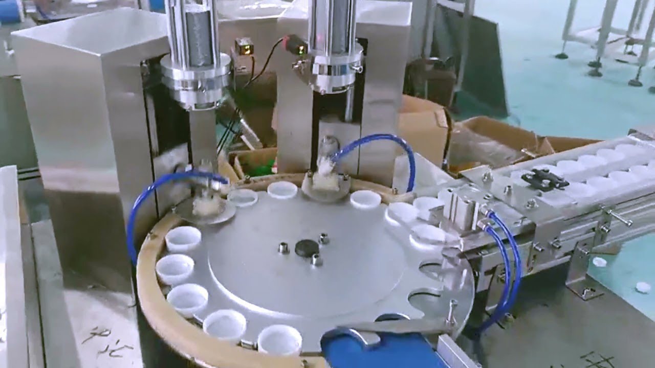 Automatic Rubber Insert Pressing Machinery Caps wadding lining equipment two heads with cap feeder