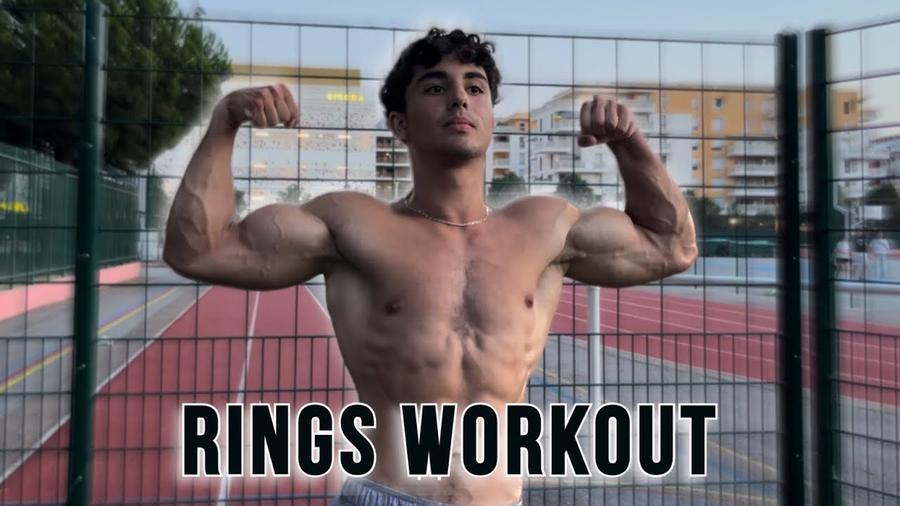 A CALISTHENICS ATHLETE DOING GYMNASTIC RINGS