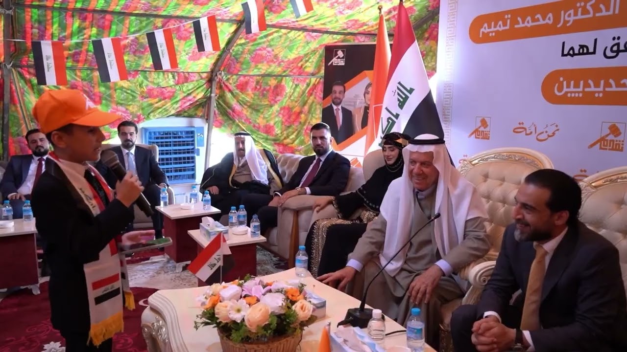 انبهار الرئيس محمد الحلبوسي بفصاحة الطفل ابراهيم اسامة سلمان الحديدي عند القاءه كلمة فصيحة .