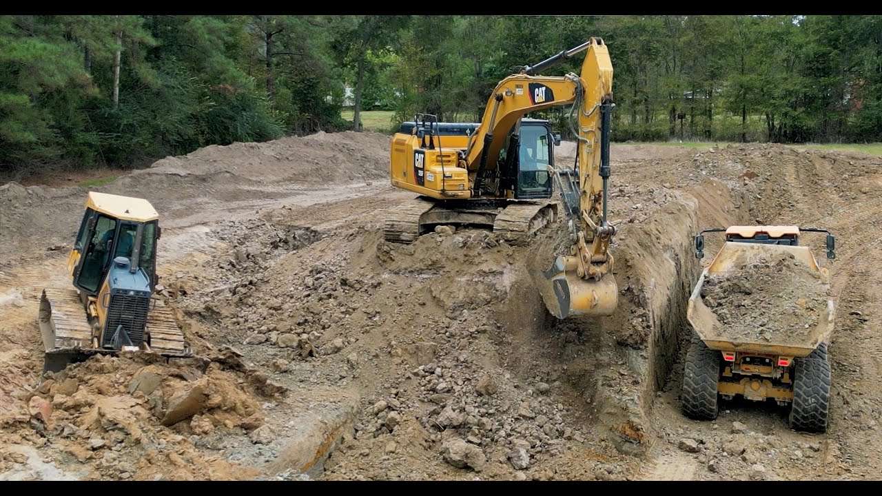 Digging a pond expansion. Doubling the size of the current pond.