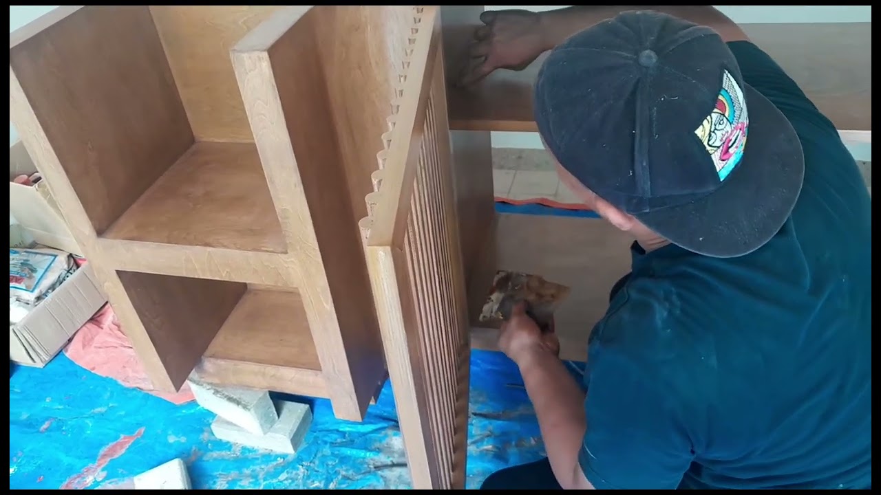 Then the cabinet is varnished.