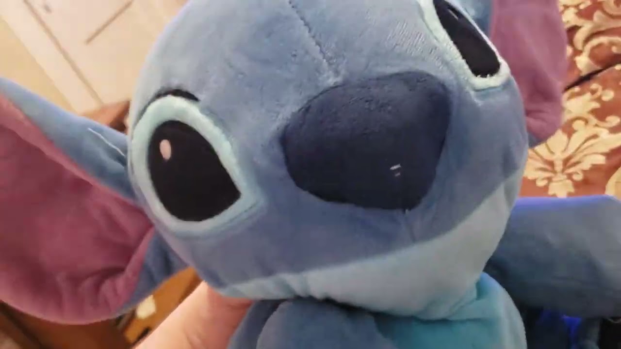 Stitch watches the 9 logos