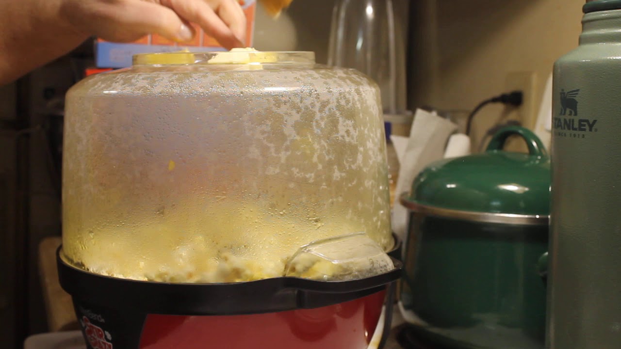 West Bend Stir Crazy. Melting butter on the lid while popping.
