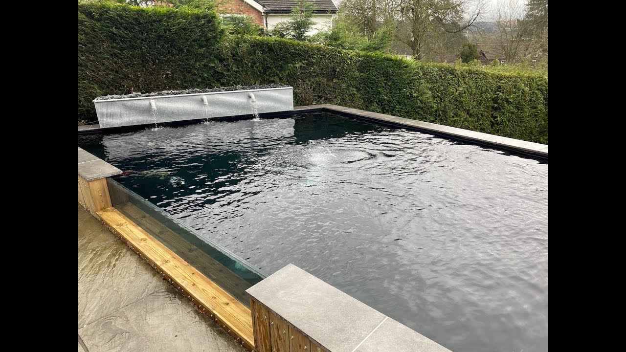 New clients 5000gallon pond in Manchester. **THE FIRST KOI BEING RELEASED, UNDERWATER FOOTAGE**