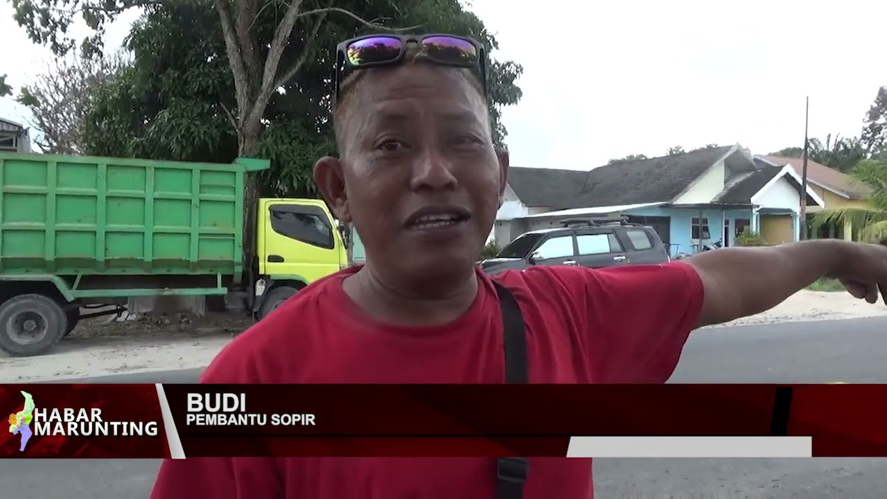 TRUK FUSSO BERMUATAN BUNGKIL SAWIT TERGULING DI  BATU BELAMAN