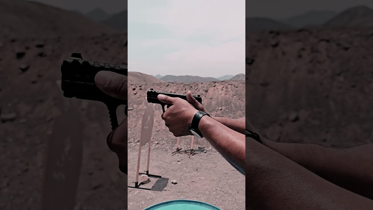 Como agarrar una pistola para disparar...