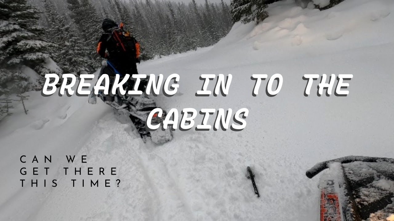 Snowmobile Ride through a Rocky Mountain Creek