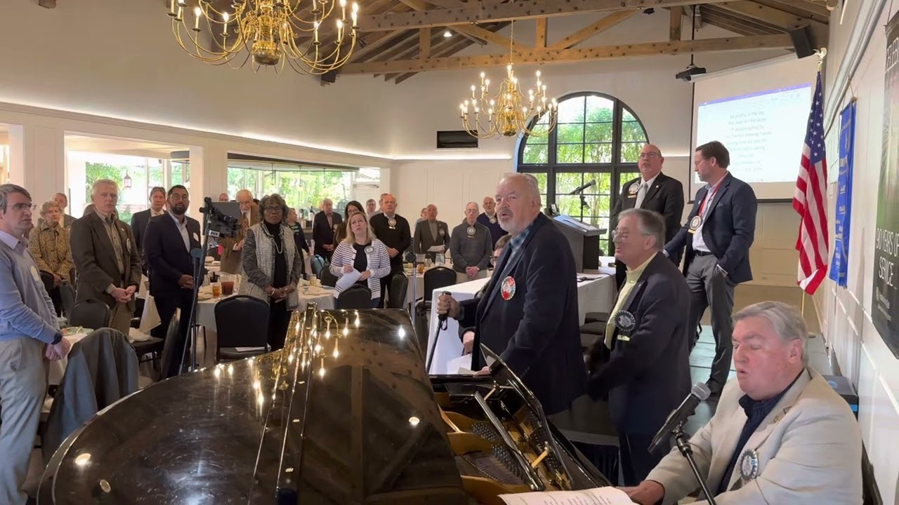 Ross Jutsum leads Pasadena Rotary in song