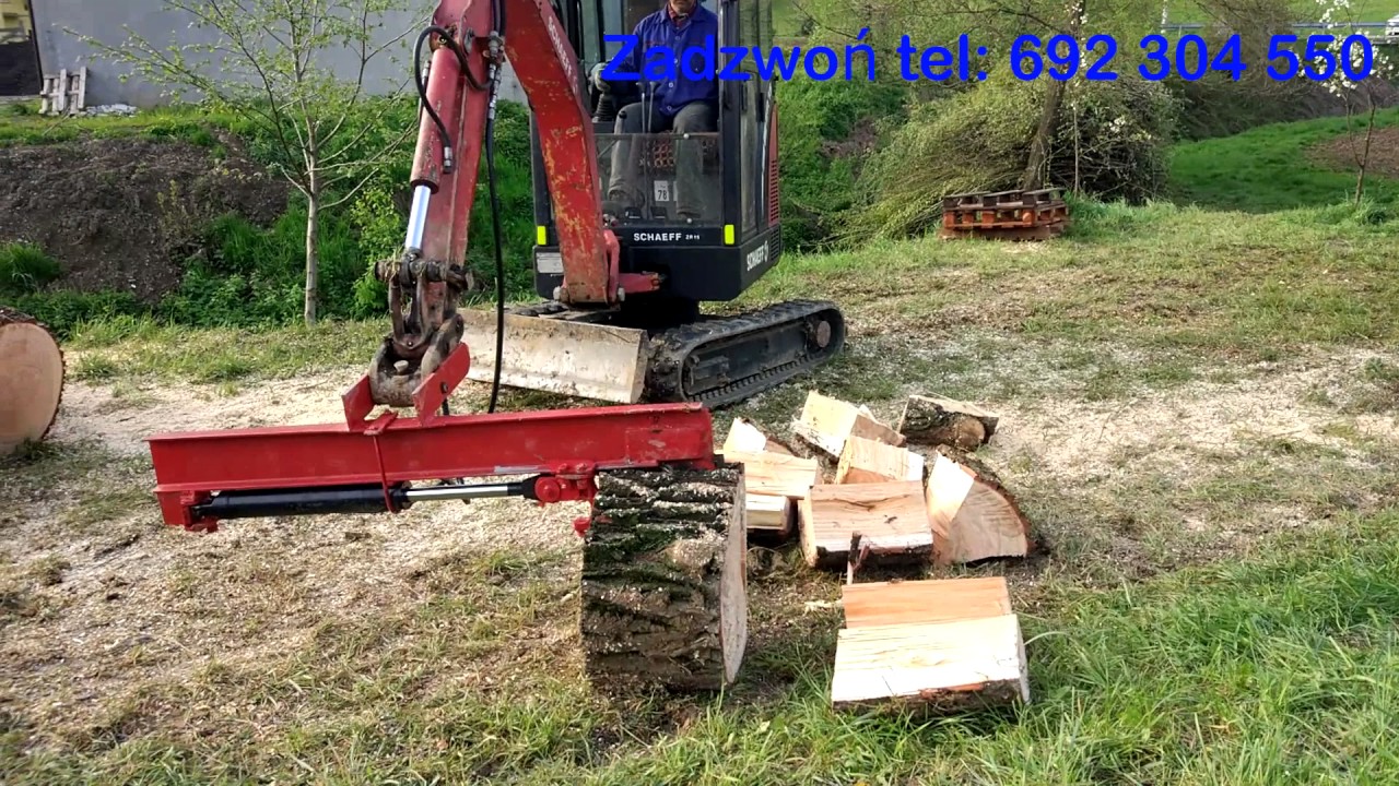 Prezentacja pracy z łuparką hydrauliczną (usługi minikoparką, układanie kostki, wiertnica glebowa)