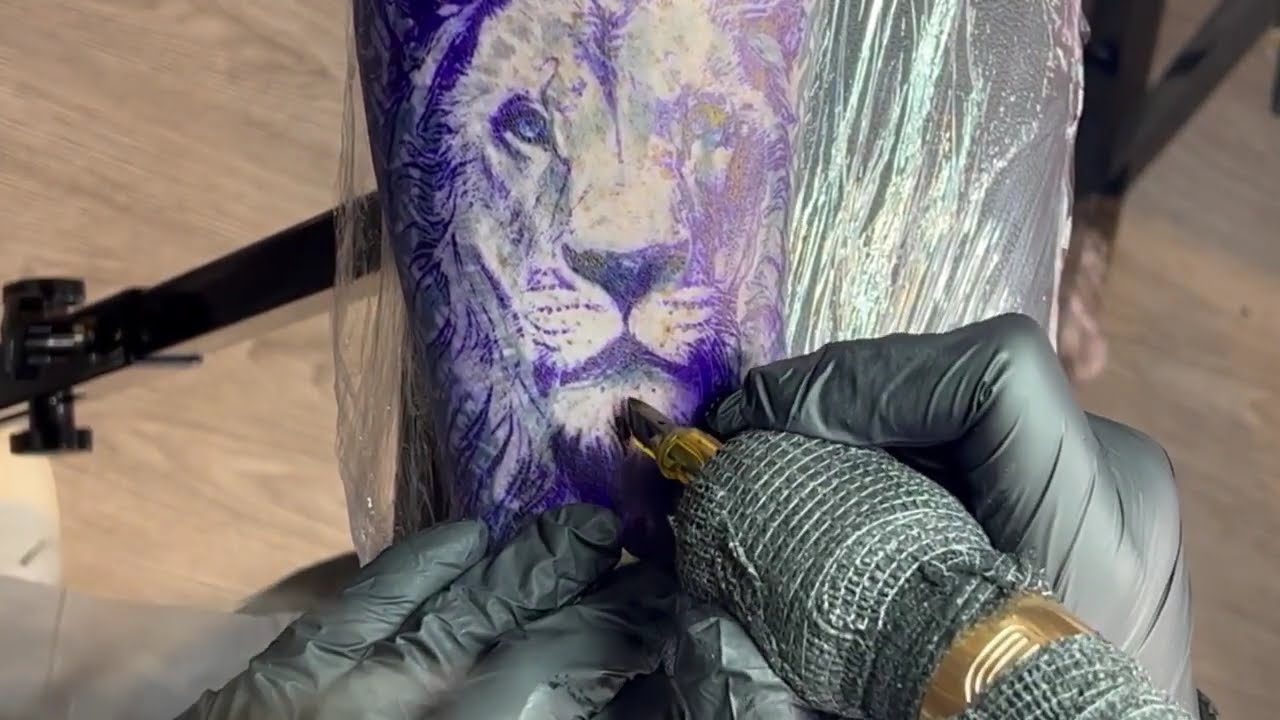 lion cover up tattoo