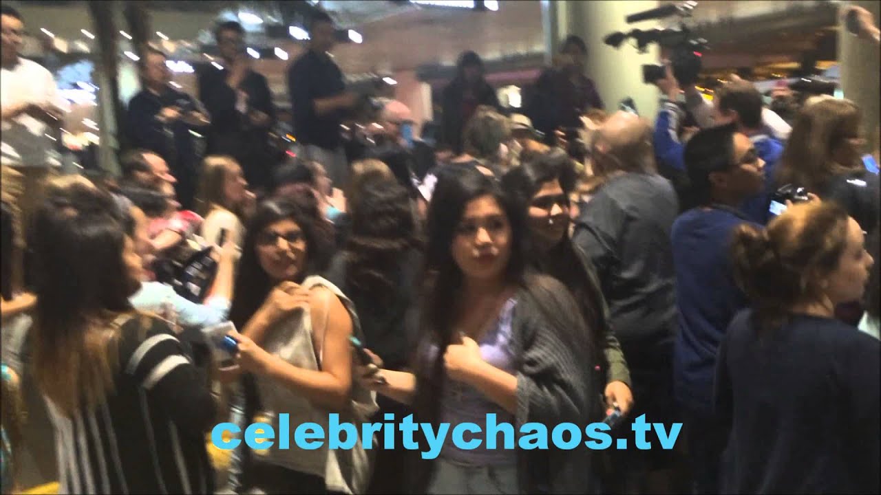 Fans run wild looking for 5 seconds of summer at LAX airport