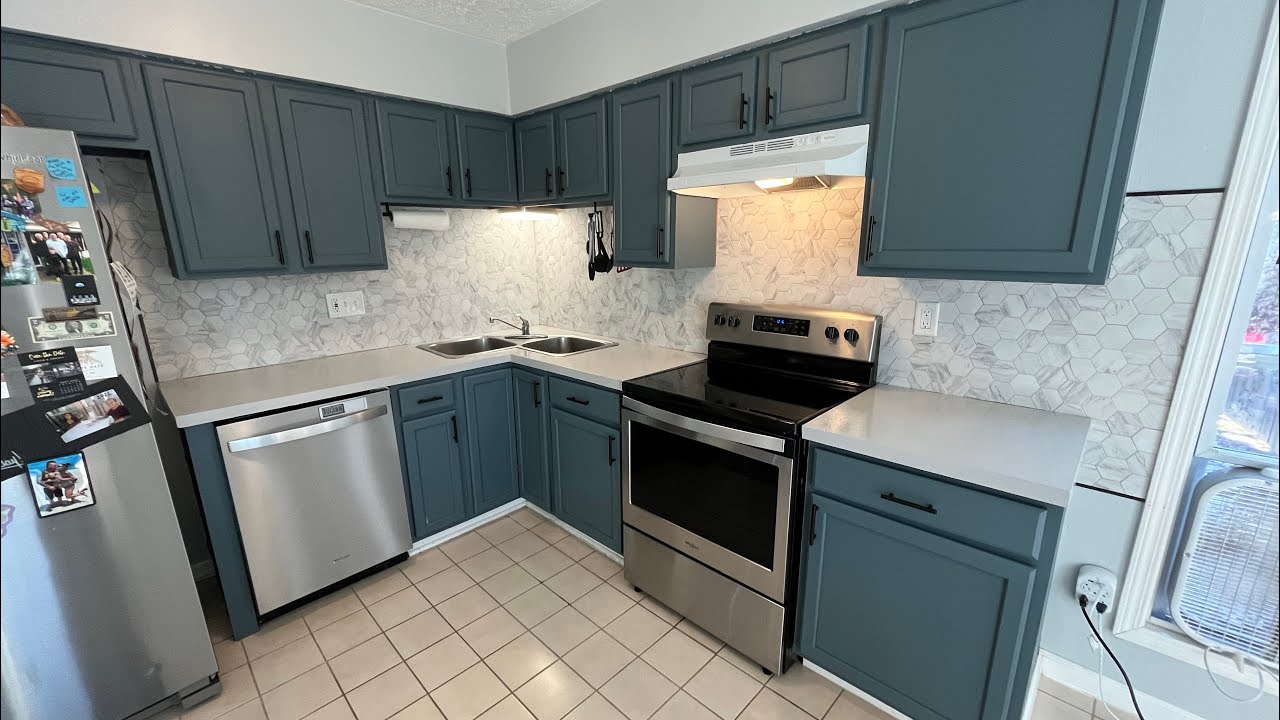 Applying Rust-Oleum counter top coating. DIY $30 dollar kitchen upgrade. #kitchen #remodel #diy
