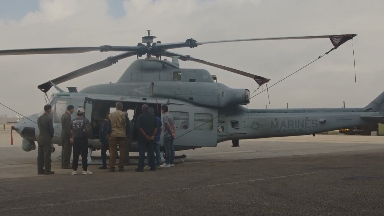 U.S. Marines fly over the Super Bowl LIX Parade in Attack Helicopters