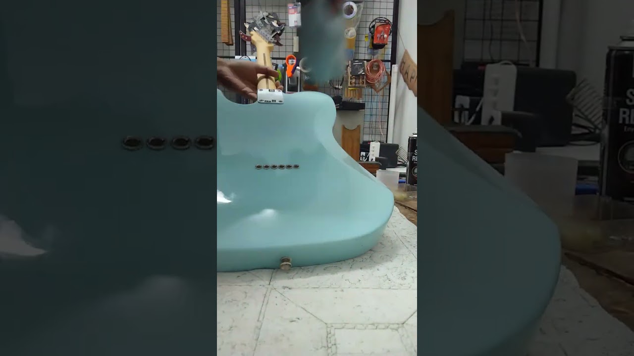grit 1500 sand paper after crowning stainless steel refret by Nonuz Luthier Guitar Repairs Malaysia