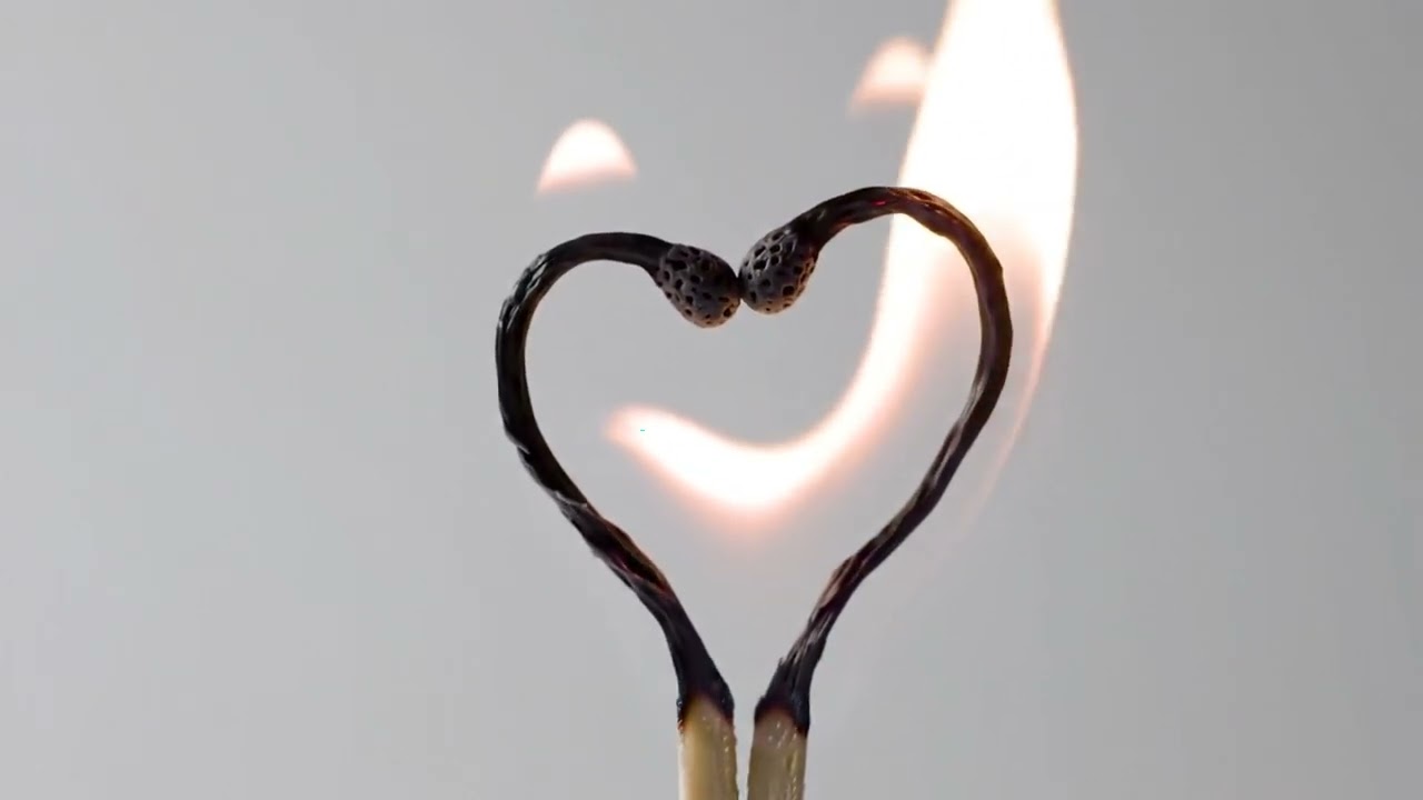 Fire in two sticks with heart shape 