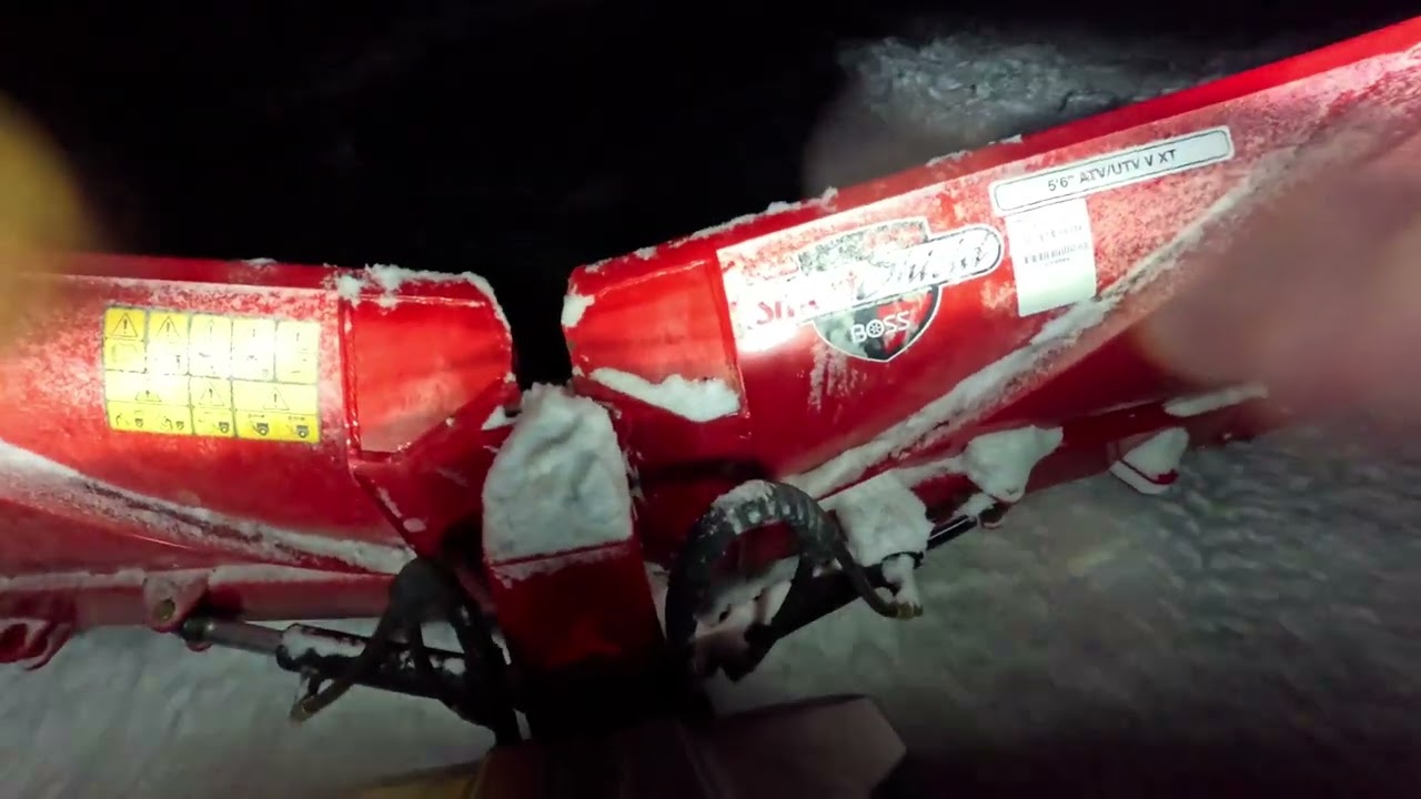 Plowing snow with the BOSS ATV v-plow