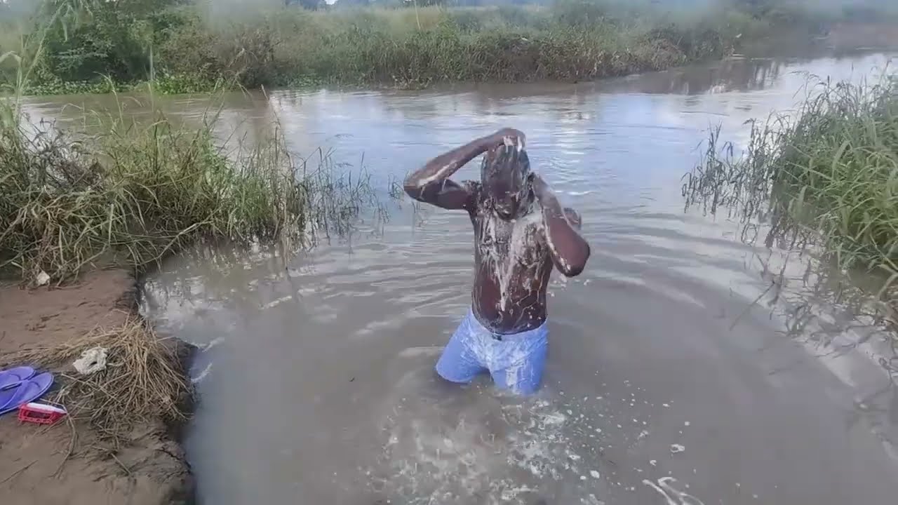 Shower/bathing in African village river