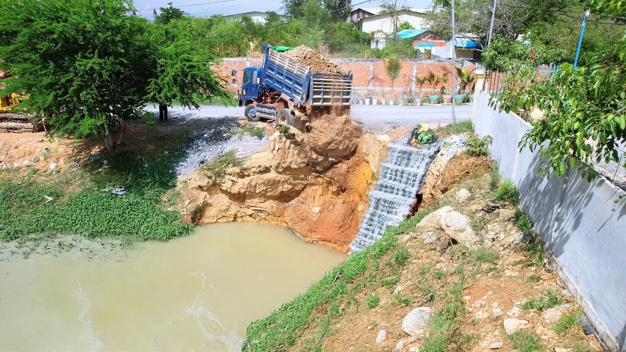 Landfill Project: Dump Truck Dumping Soil Into Deep pond | Bulldozer Pushing into Deep Water