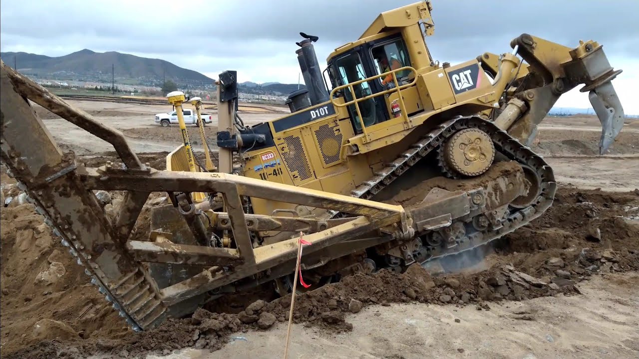 CAT D10T Dozer  ripping and pushing rock. Great operator!