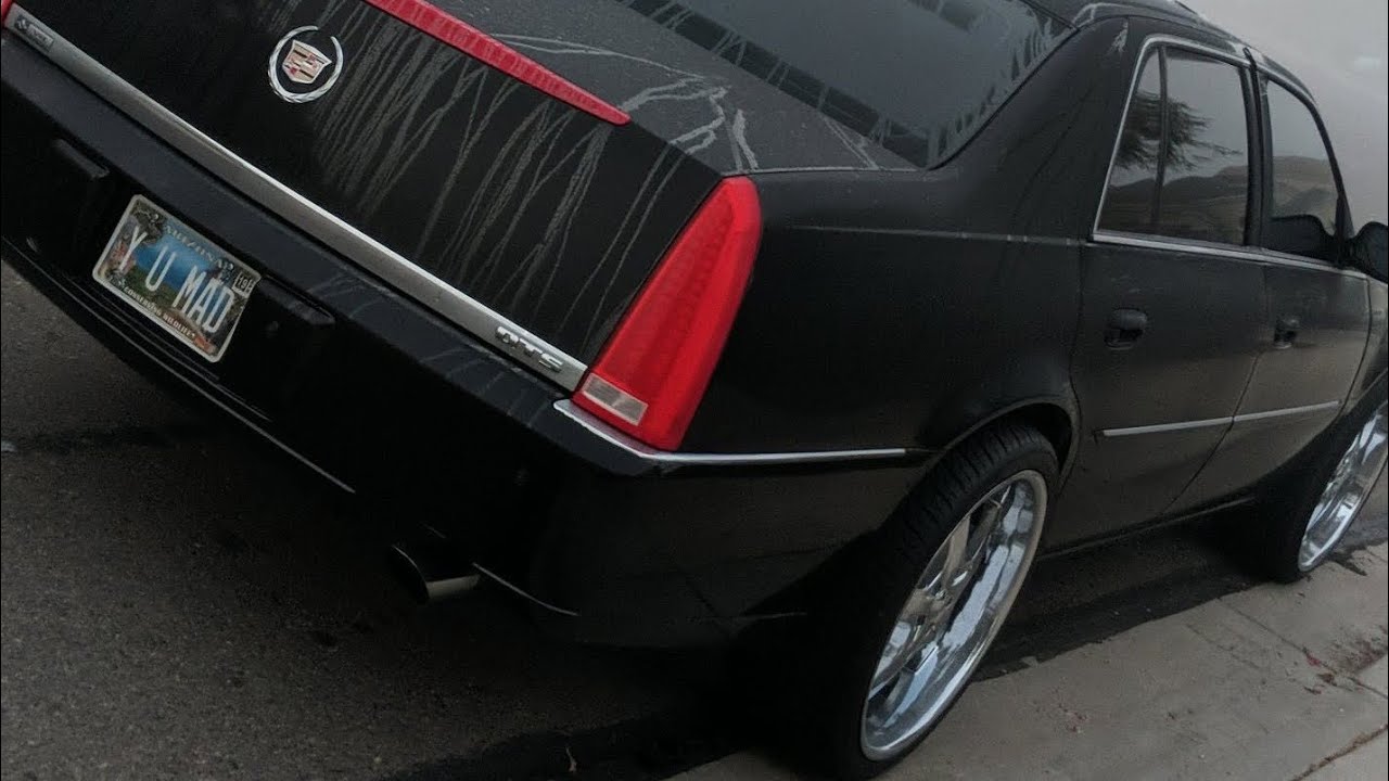 Cadillac DTS On Staggered 22s Red Flake Paint Custom Exhaust
