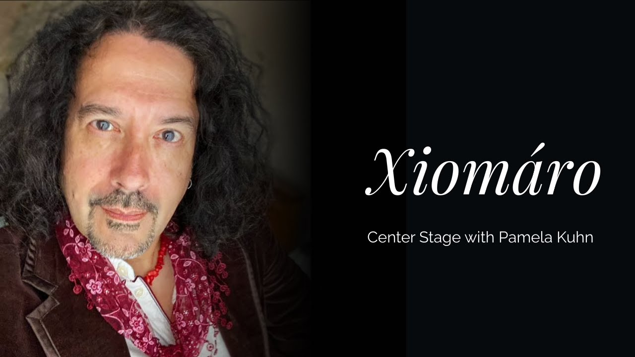 Photographer  Xiomáro on Center Stage with Pamela Kuhn