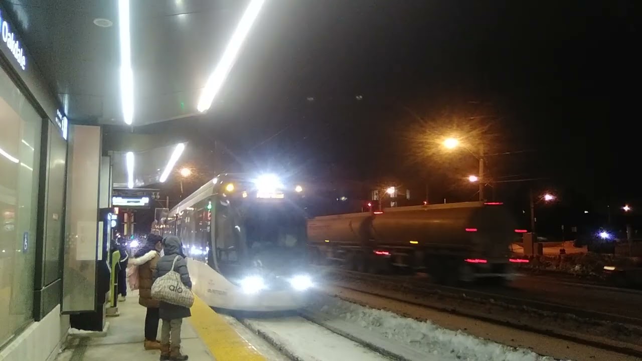finch west lrt train at norfinch oakdale stop eastbound to finch west station