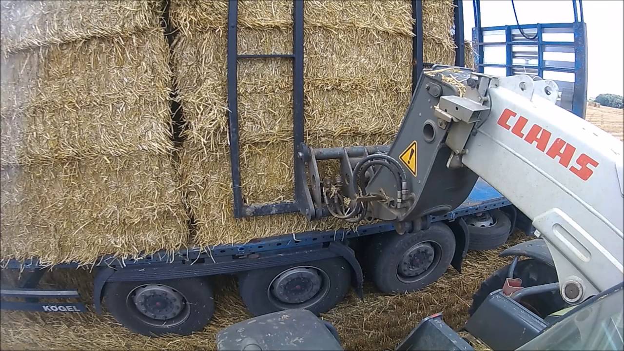CLAAS  SCORPION 7040 nakládání balíků | loading bales