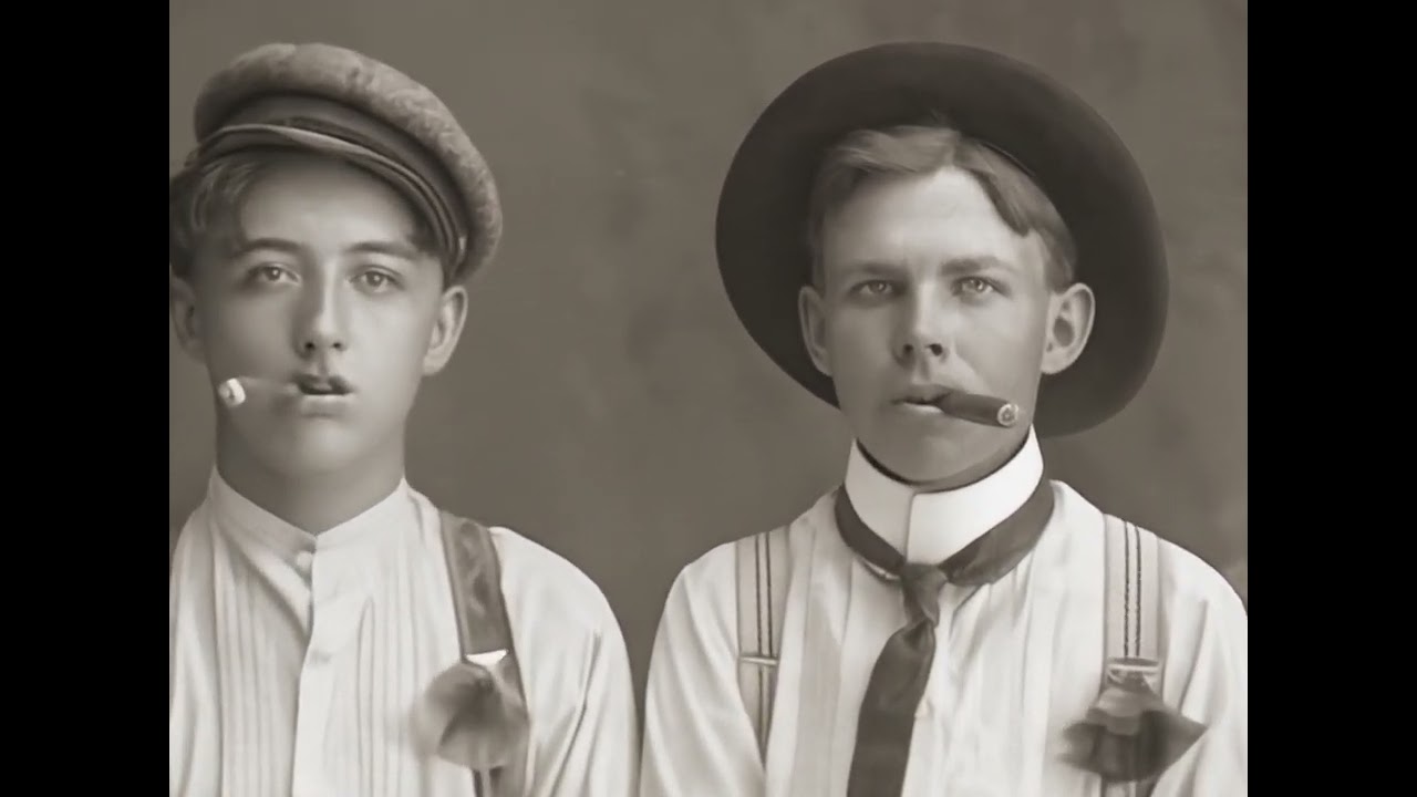 Two Blokes Smoking a Cigar in Early 1900s Phillipsburg, Kansas