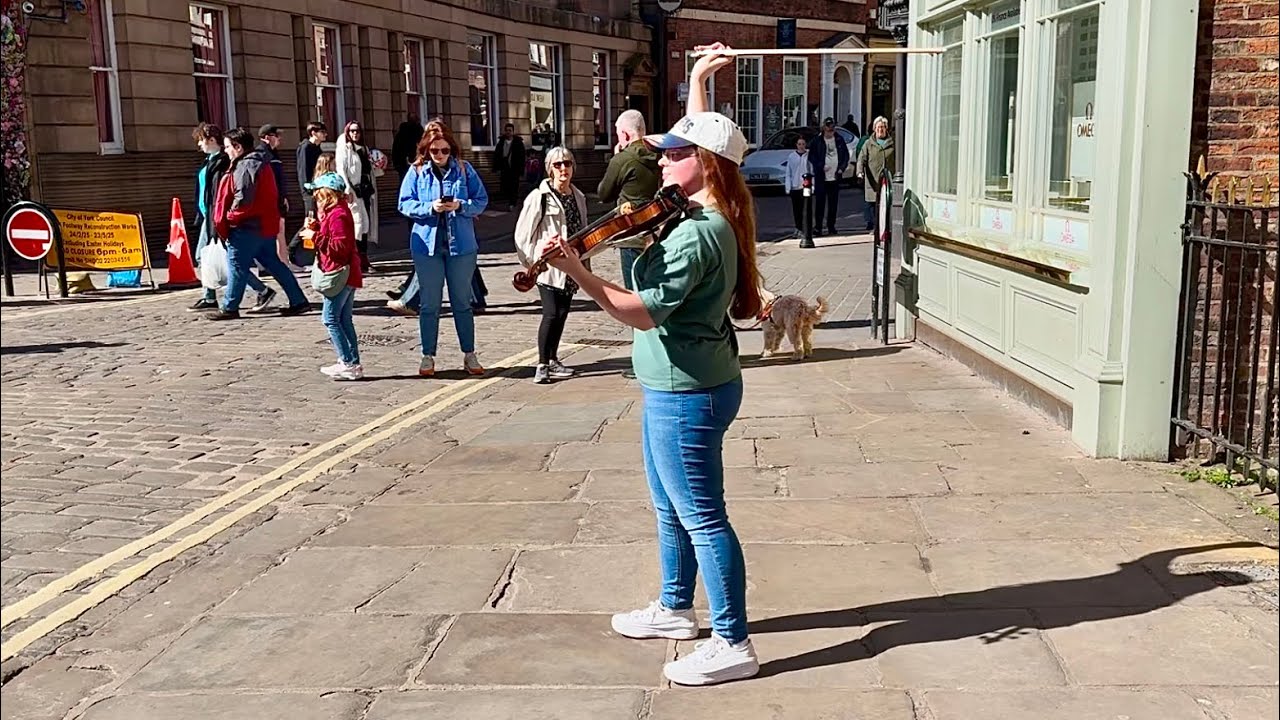 Violin busker plays Wake Me Up Before You Go-Go