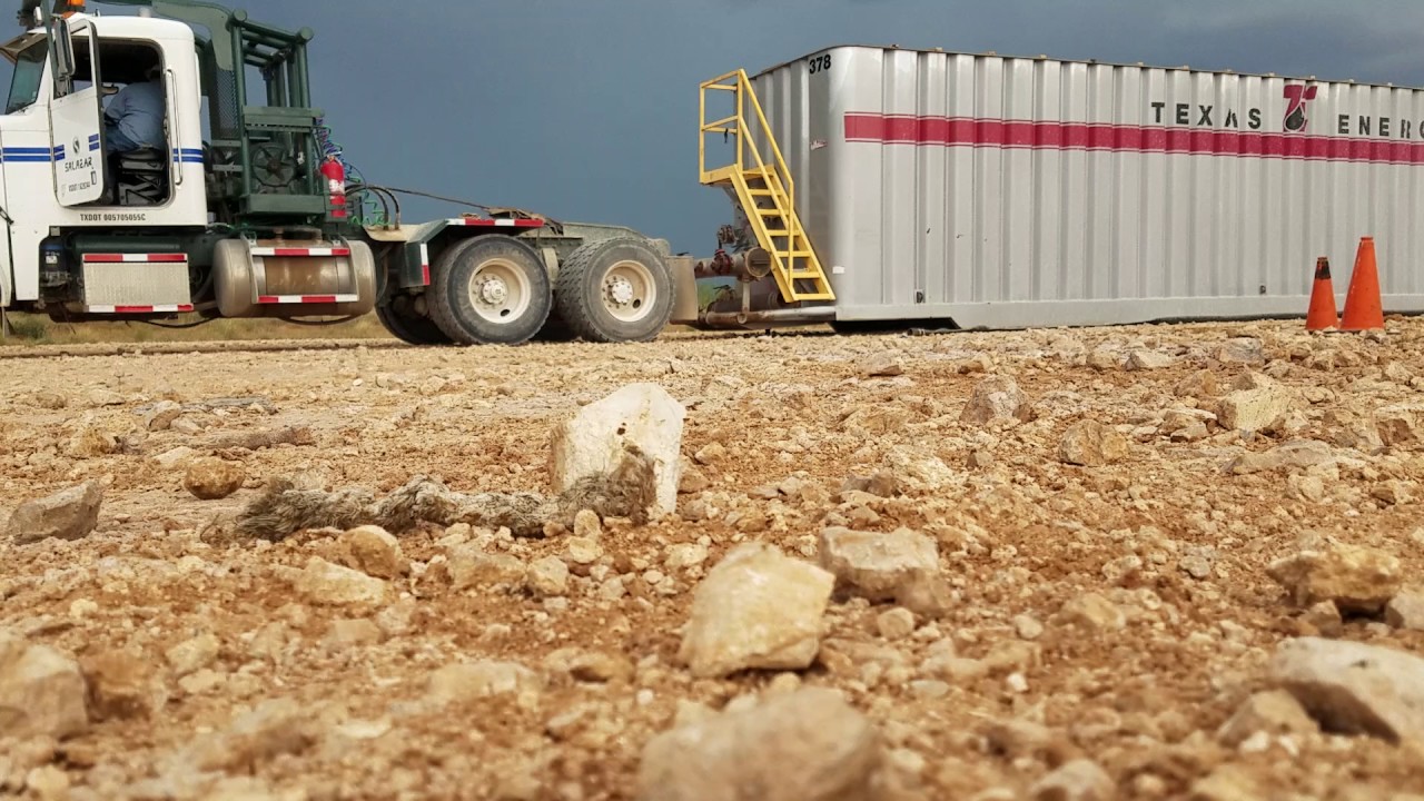 Loading frac tank on winch truck