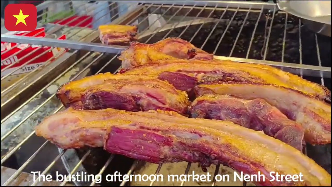 The bustling afternoon market on Nenh Street