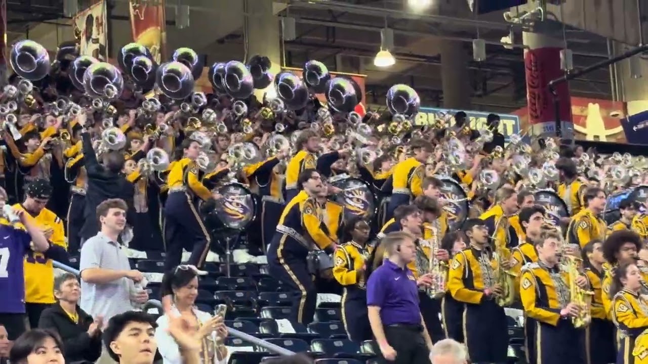 12-27-25 Texas Bowl - The LSU Marching Band celebrate a touchdown.