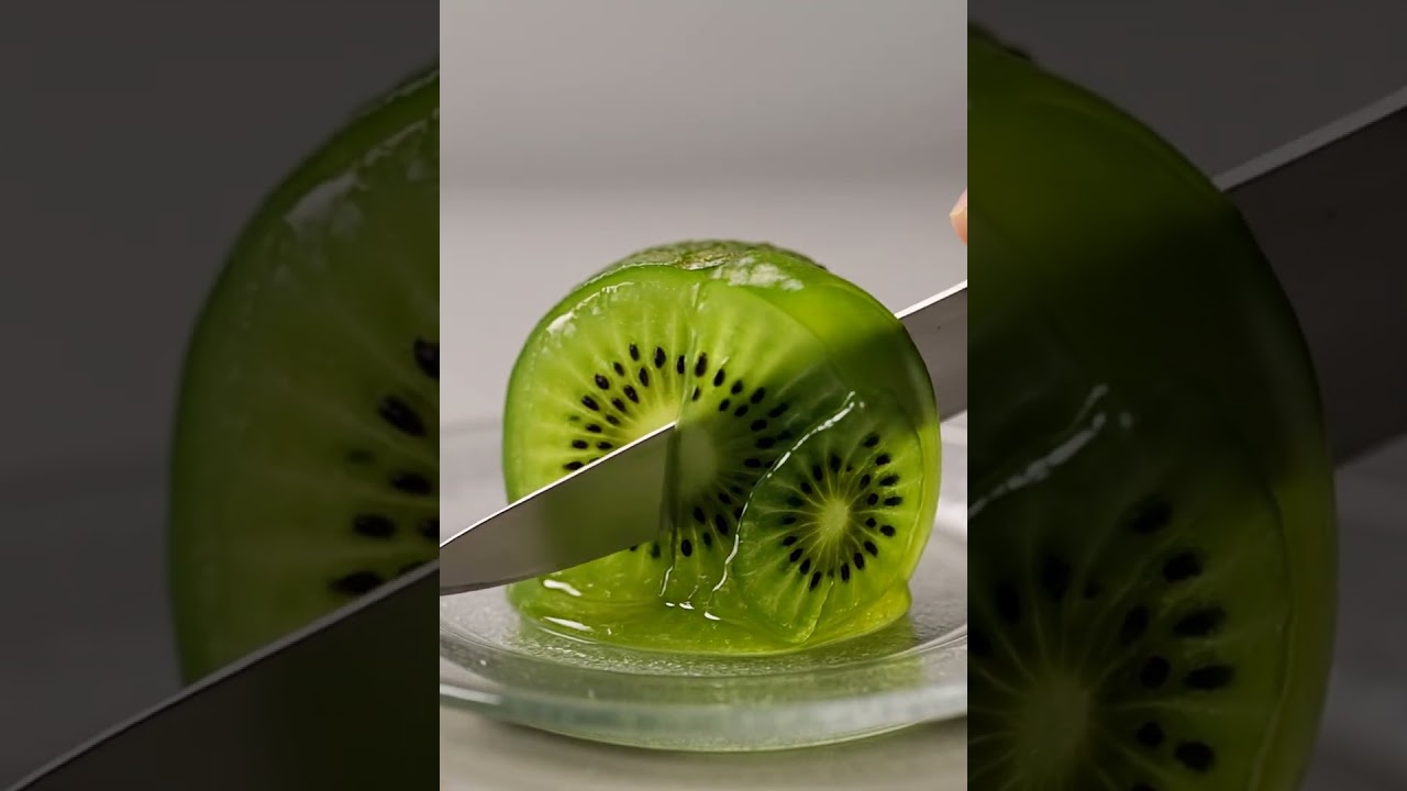 A translucent kiwi, its green jelly like flesh