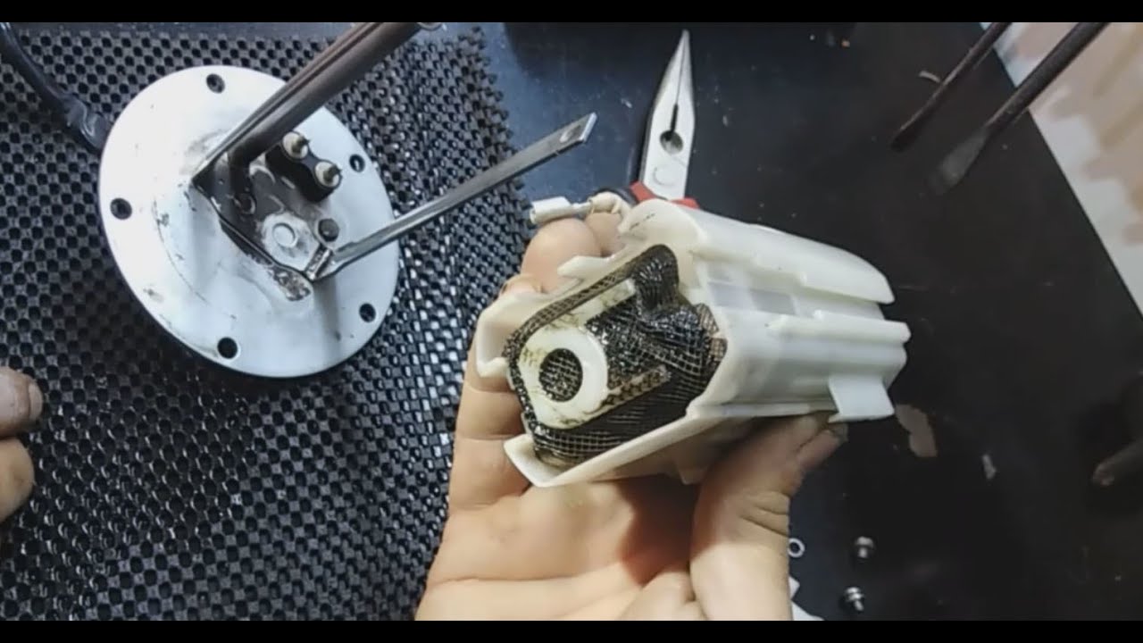 How to clean or replace fuel pump filter on suzuki v strom 1000