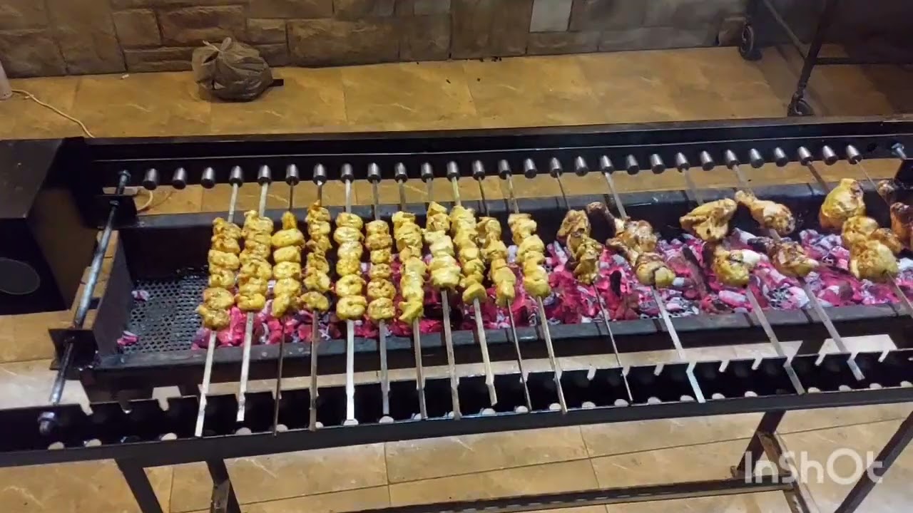 Automatically functioned/ rotating skewer holders for Charcoal Grill / Angeethi