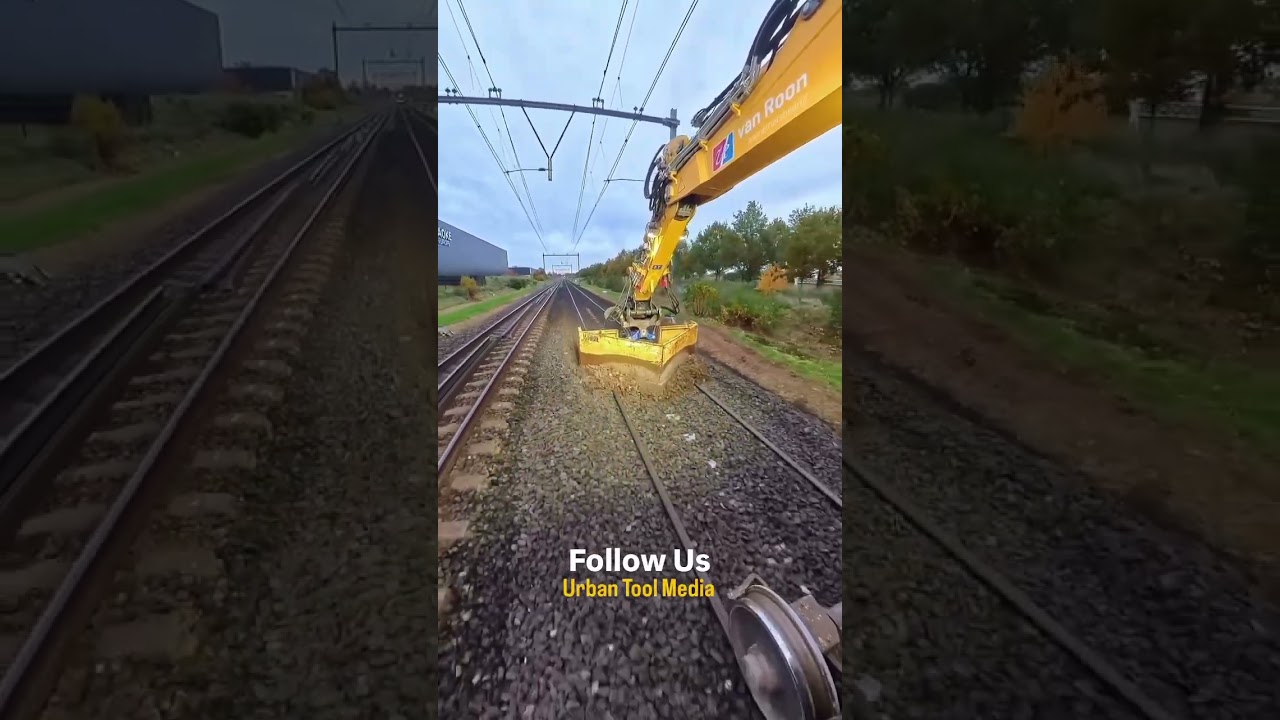 Hydraulic Bucket Excavator repairing Railway Track - Smart machines make work easy 