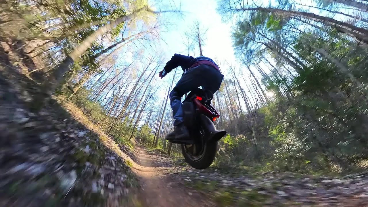 Begode Master and Kingsong S22 single track shenanigans...Crazy Train.  Dark Mountain bike trail.