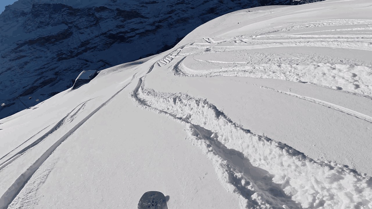 Bluebird groomers and pow snowboarding at Grindelwald-Wengen, 13th Feb