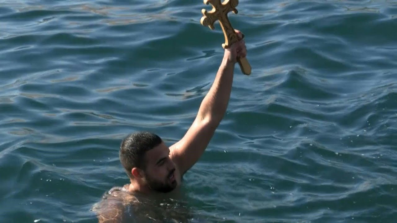 Swimmers in Greece and Turkey celebrate Epiphany with icy plunge | AFP