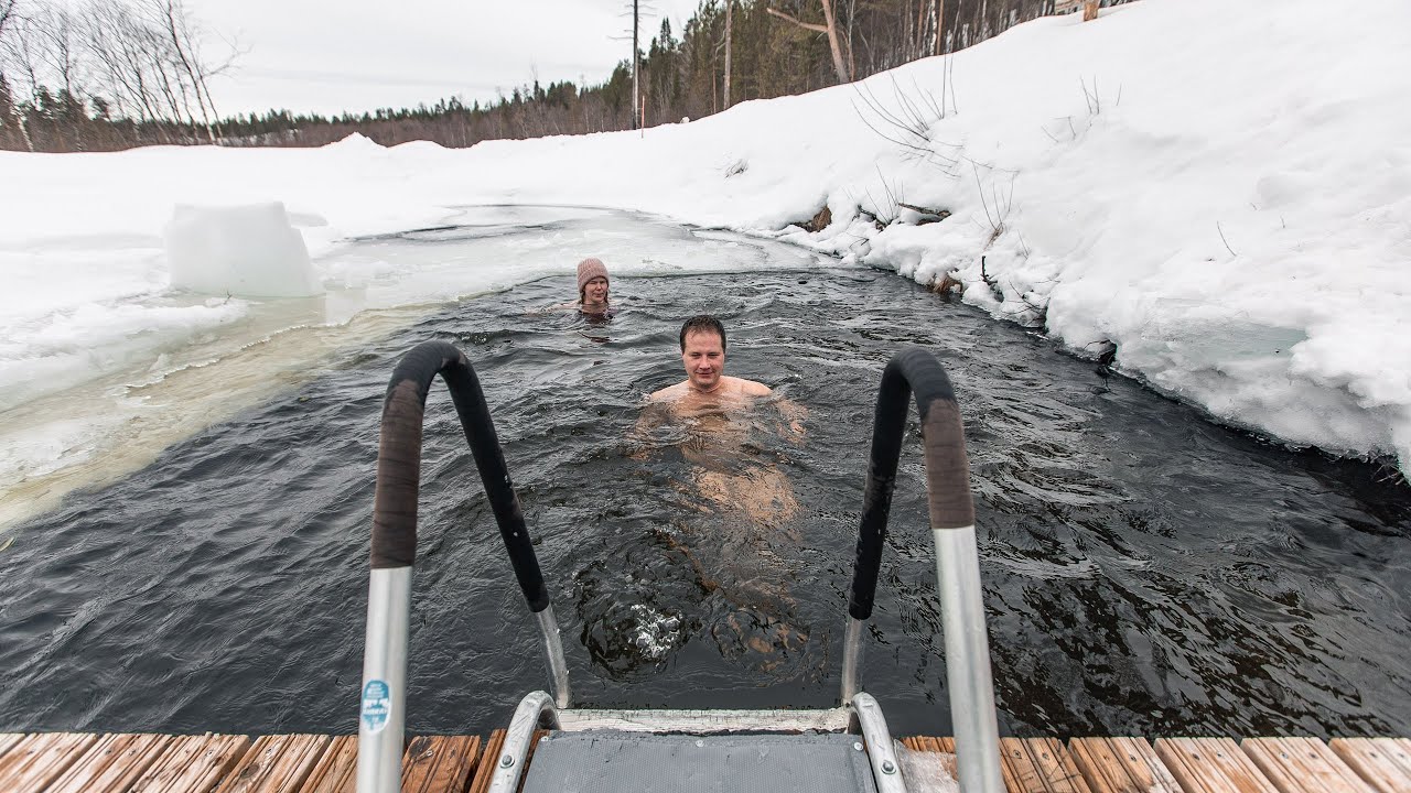Ice dipping at Aurora Village Ivalo Lapland Finland!