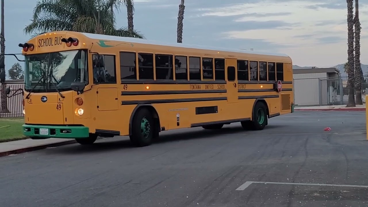 Electric School Bus 49 on a field trip for our Lunch Ladies to Redlands, plus others buses.
